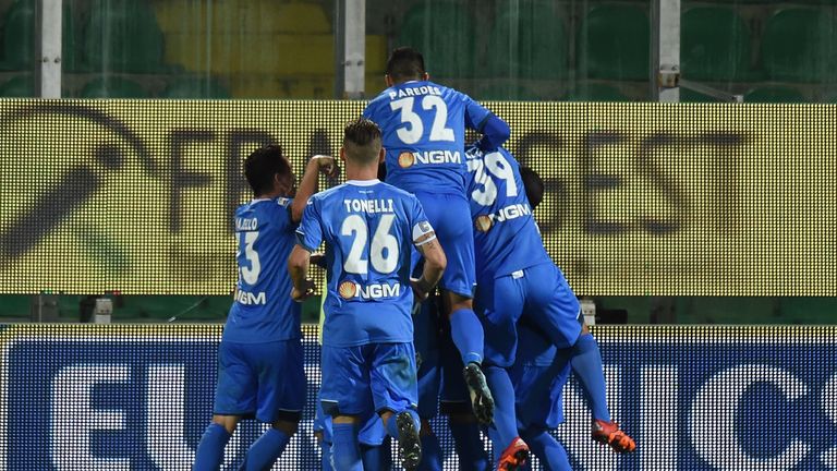 Riccardo Saponara celebrates with team mates after scoring the winner for Empoli against Palermo
