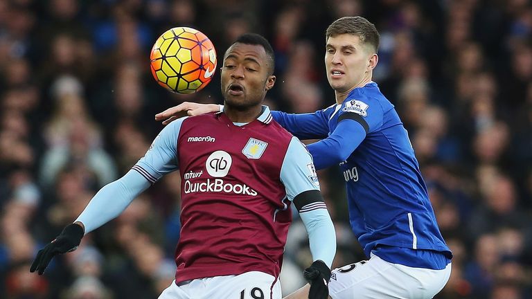 LIVERPOOL, ENGLAND - NOVEMBER 21: Jordan Ayew of Aston Villa and John Stones of Everton compete for the ball during the Barclays Premier League match betwe