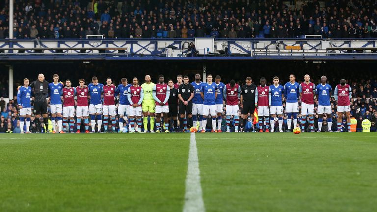 Everton and Aston Villa players pay their respects to the victims of the terror attacks in Paris