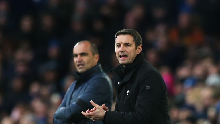 Everton manager Roberto Martinez (left) and Aston Villa boss Remi Garde