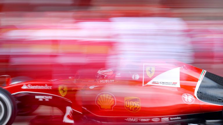 In a blur: Kimi Raikkonen makes a pitstop during the Spanish GP - Picture by Patrik Lundin, Sutton Images