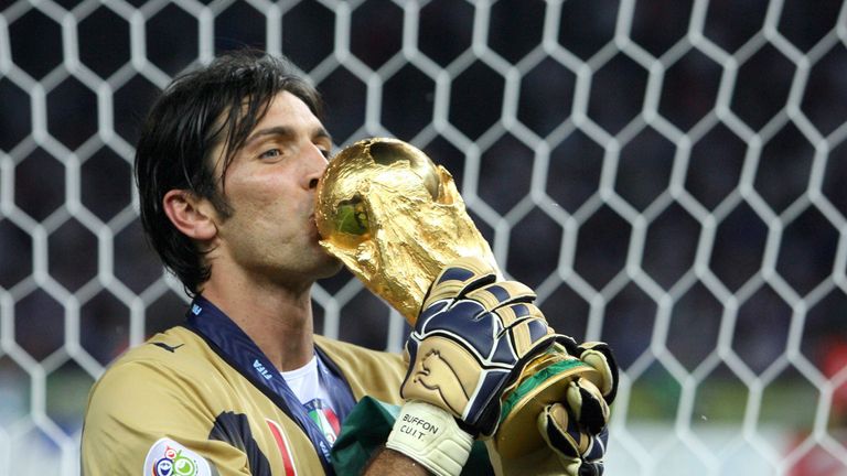 Italian goalkeeper Gianluigi Buffon kisses the trophy after the World Cup 2006 final football game Italy vs.France, 09 July 2006 at Berlin stadium.  Italy 