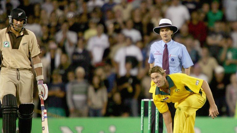 AUCKLAND, NEW ZEALAND - FEBRUARY 17: Australia's Glenn McGrath pretends to bowl the last ball of the match underarm as New Zealand's Daryl Tuffey (L) and u