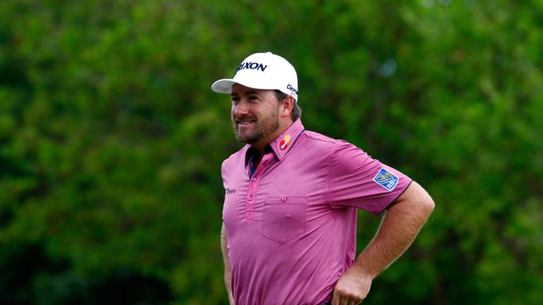 McDowell made three birdies in four holes before play was suspended due to darkness