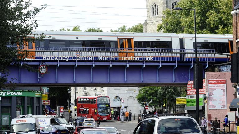 Automobiles ride along Mare street in Hackney, London, on August 11, 2011, the scene of rioting on August 8. After a relatively quiet night on London's str