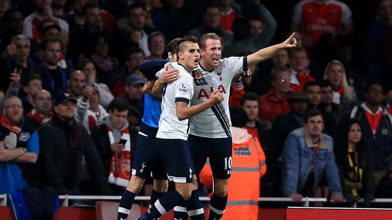 Tottenham Hotspur's Harry Kane (right) celebrates scoring their first goal against Arsenal with team-mate Erik Lamela (left)
