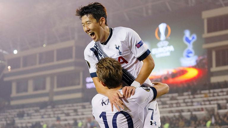 Harry Kane is congratulated by Heung-Min Son after opening the scoring in Baku