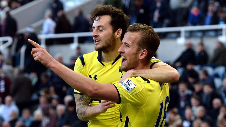 Harry Kane celebrates scoring their third goal with Ryan Mason of Spurs (L) during the Barclays Premier League match between Newcastle United and Tottenham