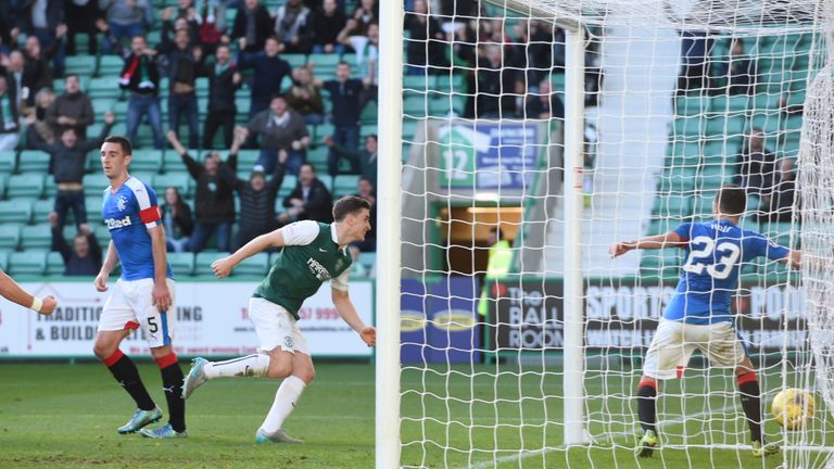 Hibernian's Paul Hanlon (centre) wheels away after putting his side 2-1 up