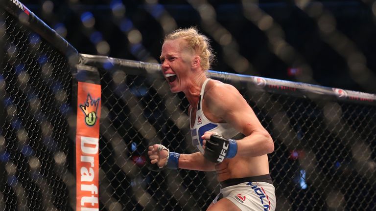 Holly Holm of the United States celebrates victory over Ronda Rousey