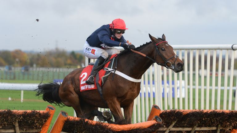 Bobs Worth ridden by Nico de Boinville clears the final hurdle to win the Betfred Hurdle at Aintree Racecouse.