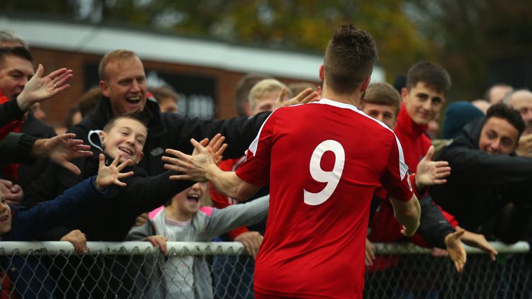 Jake Robinson of Whitehawk FC celebrates scoring the second goal during the Emirates FA Cup First Round match between Whi