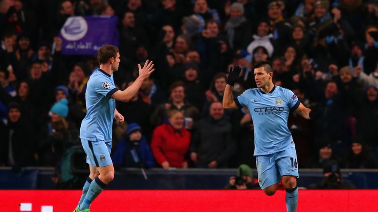 MANCHESTER, ENGLAND - FEBRUARY 24:  Sergio Aguero of Manchester City (R) celebrates with James Milner of Manchester City after scoring their first goal dur