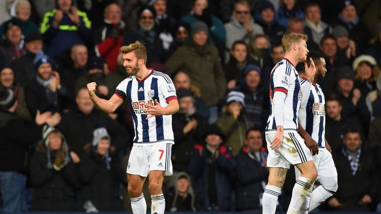 James Morrison of West Brom celebrates scoring his team's first goal against Arsenal.