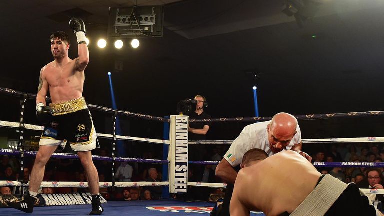 Jamie Cox (L) knocks out Ferenc Albert (R) during their super middleweight bout  in Dublin