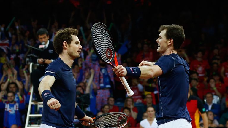 Jamie Murray and Andy Murray of Great Britain celebrate defeating Steve Darcis and David Goffin of Belgium in the doubles, Davis Cup final, Ghent