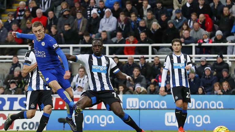 Leicester City's English striker Jamie Vardy (2nd L) scores his team's first goal during the English Premier League football match between Newcastle United