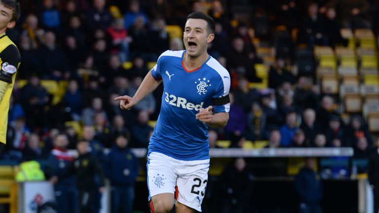 Jason Holt celebrates after firing Rangers into the lead  at Livingston