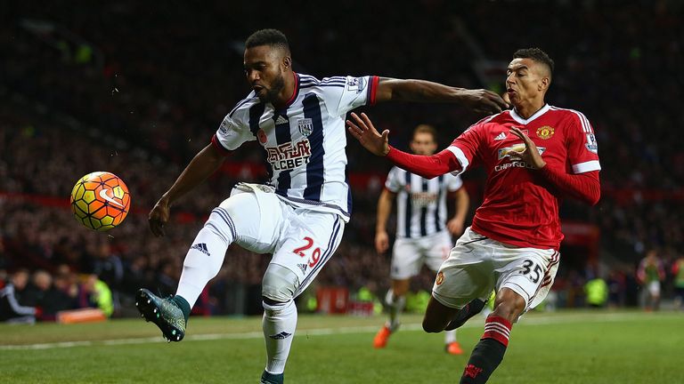 Stephane Sessegnon of West Bromwich Albion in action with Jesse Lingard of Manchester United