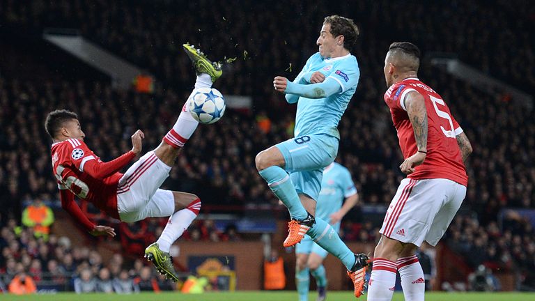 Manchester United midfielder Jesse Lingard (L) attempts an overhead kick