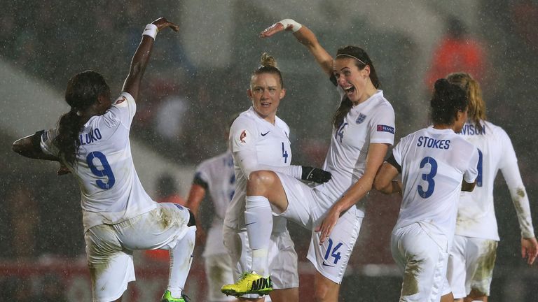 Jill Scott (r) celebrates her goal with team-mate Eni Aluko