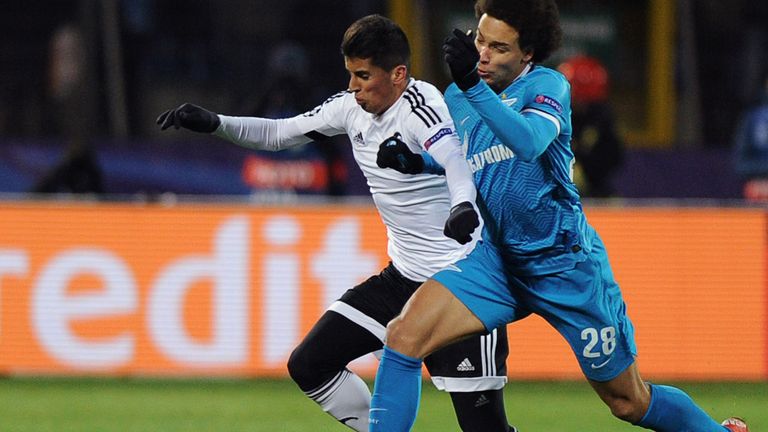 Zenit's Axel Witsel (right) vies for the ball with Valencia defender Joao Cancelo