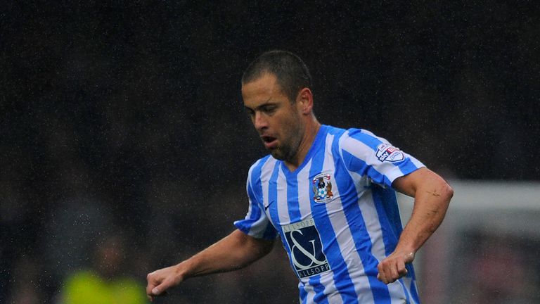 Joe Cole of Coventry City in action against Swindon
