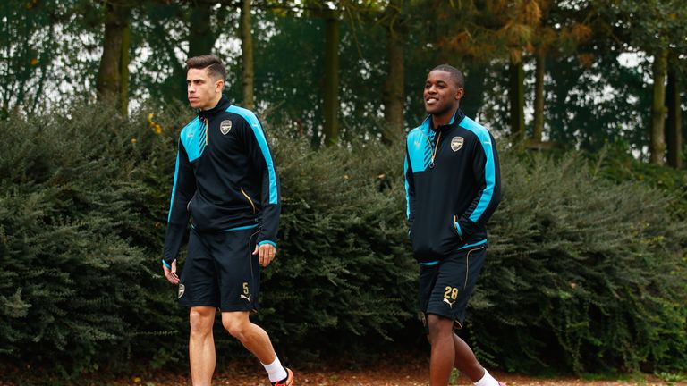 Joel Campbell (R), pictured with Gabriel at training, is expected to keep his place after scoring at Swansea