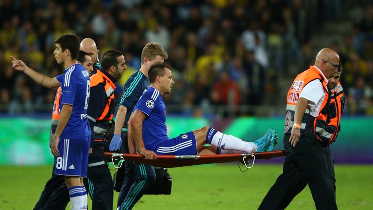 John Terry of Chelsea leaves the field on a stretcher