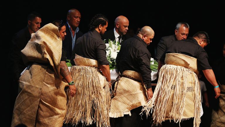 The casket containing the body of Jonah Lomu is carried out by Lomu family members after the Aho Faka Family memorial