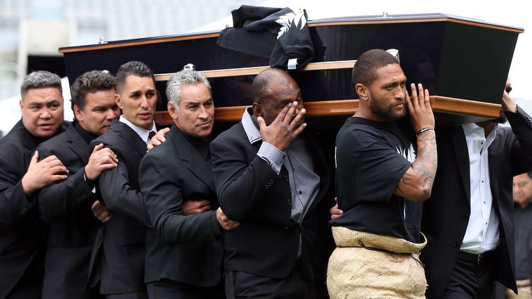 The casket of late New Zealand All Blacks rugby legend Jonah Lomu is carried after a memorial service at Eden Park in Auckland