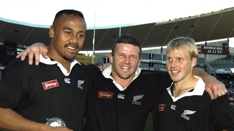29 July 1995:  Jonah Lomu (left), Sean Fitzpatrick (centre) and Jeff Wilson (right) of New Zealand hold the Bledisloe Cup after winning the  Final against 
