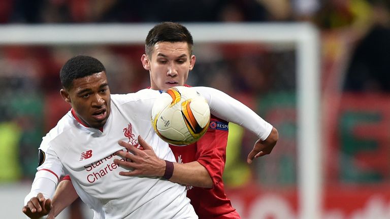 Liverpool midfielder Jordon Ibe (L) vies for the ball with Rubin Kazan midfielder Elmir Nabiullin during the UEFA Europa League group B match