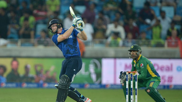 Jos Buttler of England hits out for six runs during the 4th One Day International between Pakistan and England at Dubai Cricket Stadium