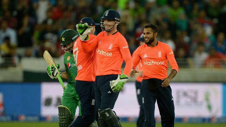 Jos Buttler of England celebrates stumping Rafatullah Mohmand of Pakistan during the 2nd International T20 in Dubai