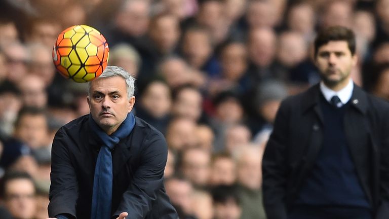 Jose Mourinho catches the ball during Chelsea's clash with Tottenham