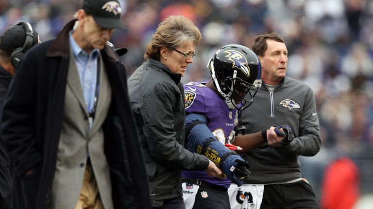 BALTIMORE, MD - NOVEMBER 22: Running back Justin Forsett #29 of the Baltimore Ravens is helped off of the field after an injury in the first quarter agains
