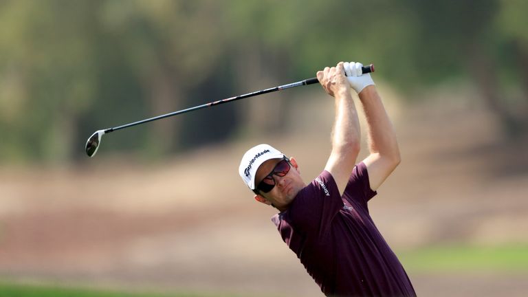 Justin Rose of England plays his second shot on the par 5, 7th hole during the third round of the 2015 DP World 