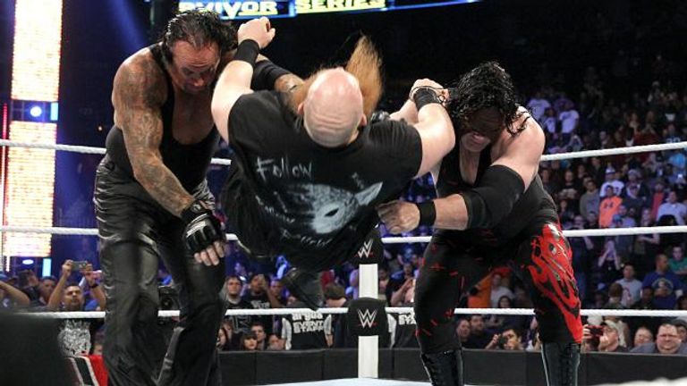 Kane and Undertaker attack Erick Rowan