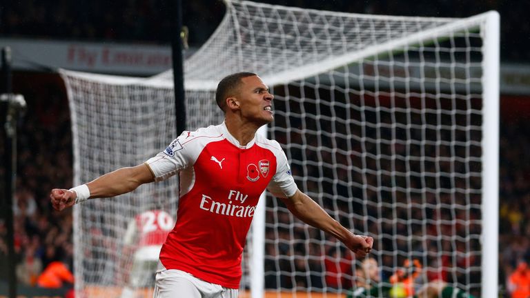 Kieran Gibbs celebrates scoring Arsenal's equalising goal against Tottenham Hotspur at the Emirates Stadium on November 8, 2015