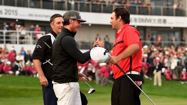 Broberg is congratulated by Reed after his winning birdie