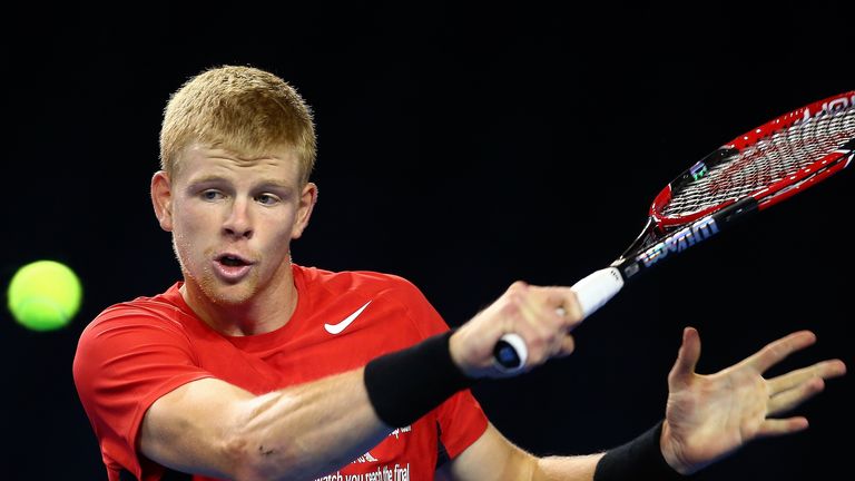 Kyle Edmund of Great Britain plays a backhand during a practice session at Emirates Arena