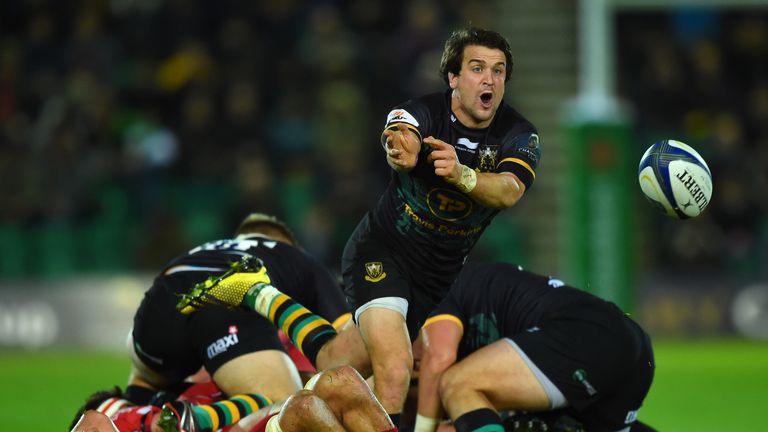 Lee Dickson of Northampton passes the ball during the European Rugby Champions Cup match v Scarlets