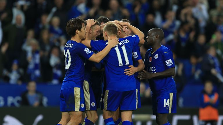 Leicester City's Jamie Vardy (second left) celebrates scoring his side's second goal of the game during the Barclays Premier League match against Watford