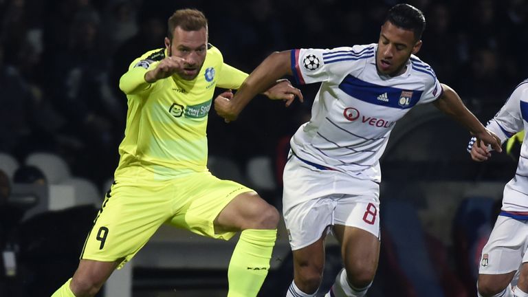 Gent's Belgian forward Laurent Depoitre vies with Corentin Tolisso of Lyon
