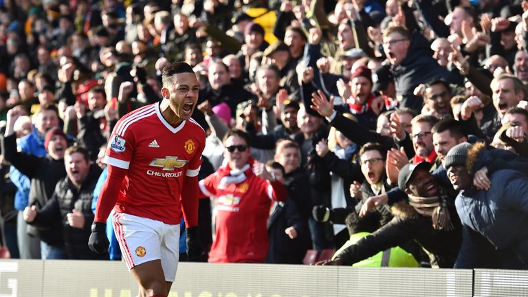 Man Utd's Memphis Depay celebrates scoring the opening goal against Watford.