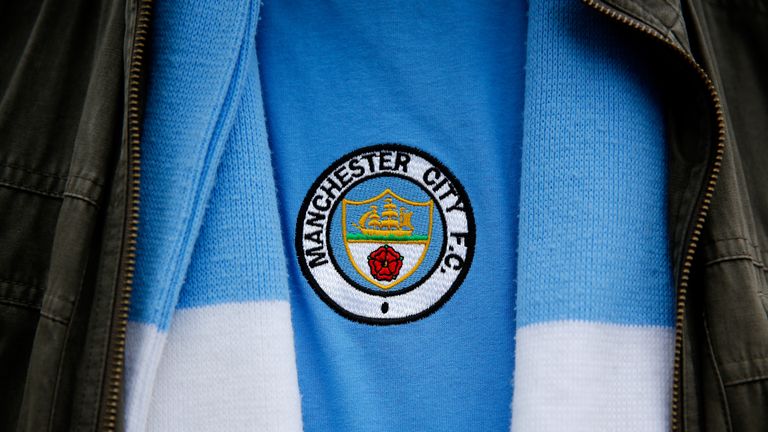 Manchester City supporters have voted to return to a circular badge