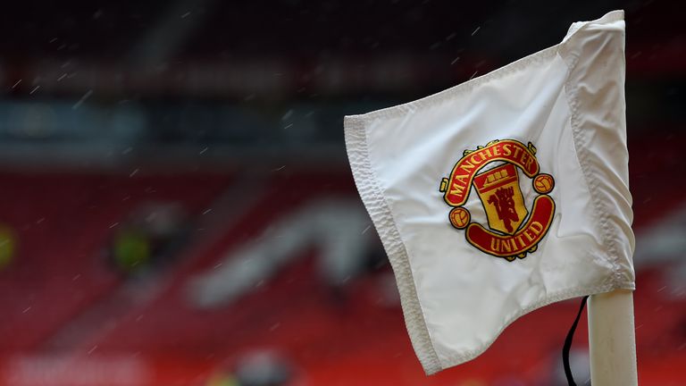 The Manchester United badge is seen on a corner flag