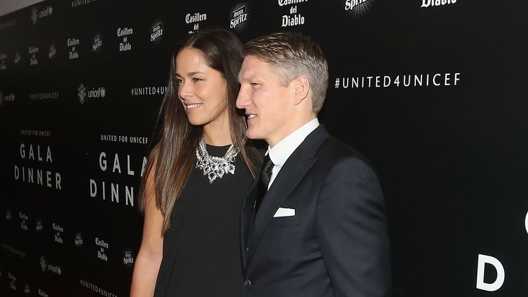 Bastian Schweinsteiger arrives with girlfriend Ana Ivanovic for the United for UNICEF Gala Dinner at Old Trafford 