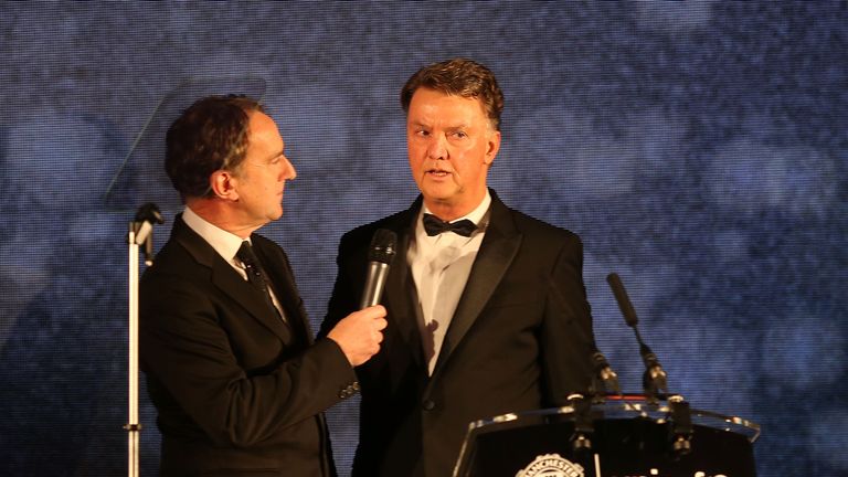 Louis van Gaal is interviewed by host Angus Deayton at the United for UNICEF Gala Dinner at Old Trafford 